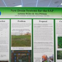 A student project poster on display.